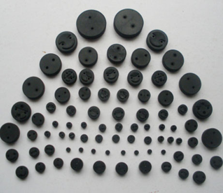 Capacitor rubber seal plug